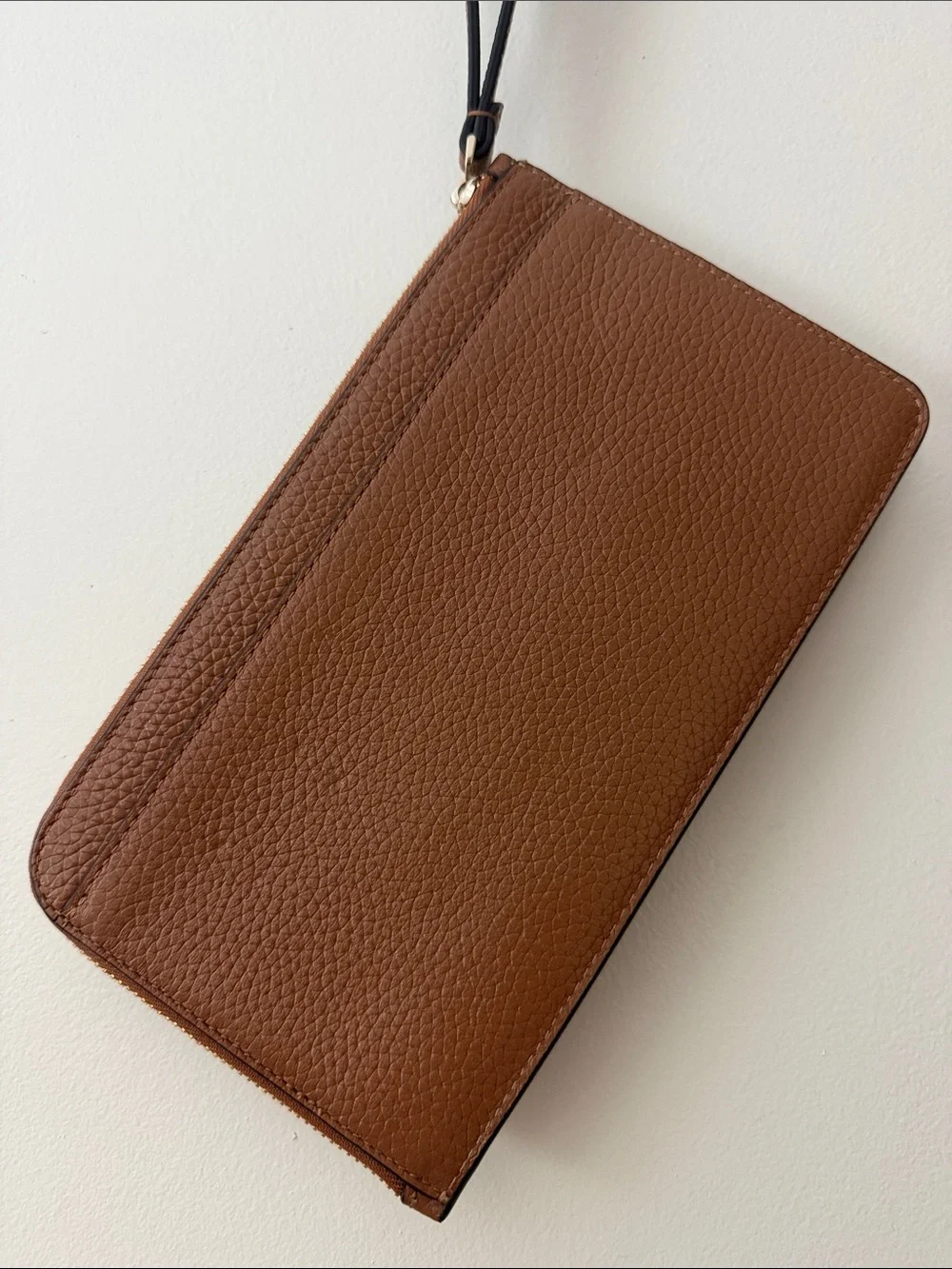 kate spade Pebbled Leather Wristlet with Strap in Warm Gingerbread